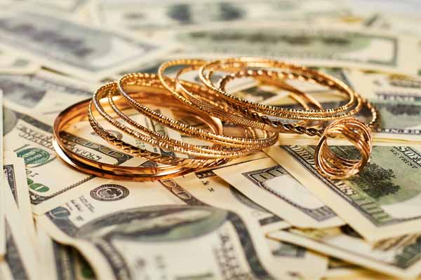 Pros and Cons of Selling Gold